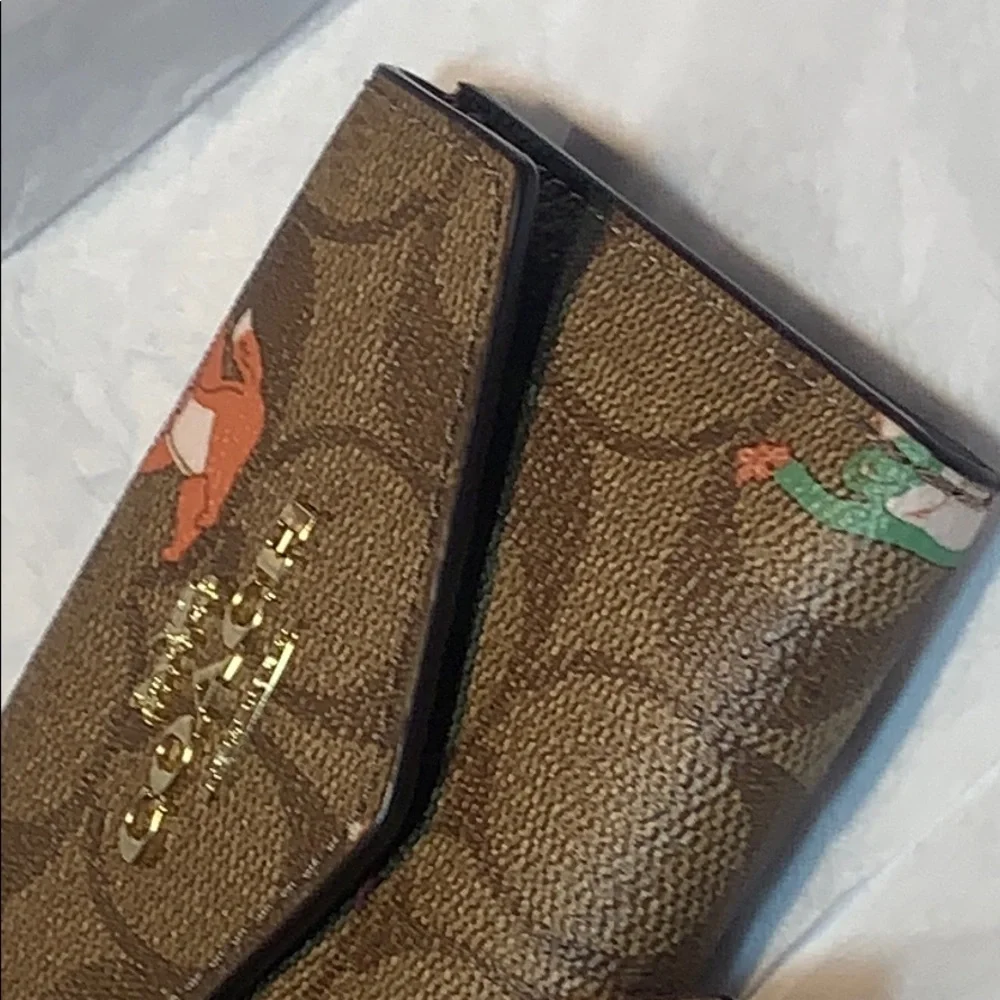 NWT Coach limited edition leashed wallet w/mirror